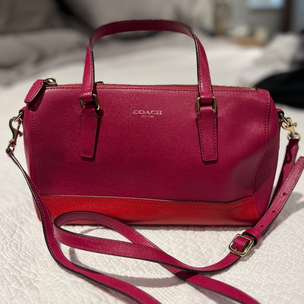 Beautiful and unique small Coach purse. Approximately 10” x 6”.